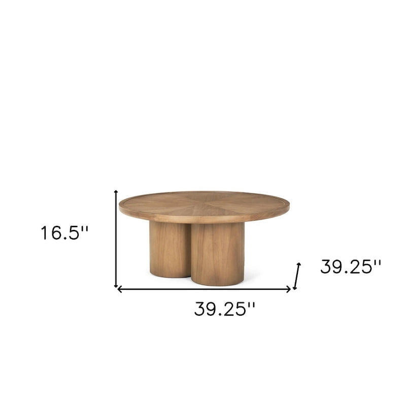 Table basse ronde de 99 cm en orme massif, piètement central à trois colonnes, naturel