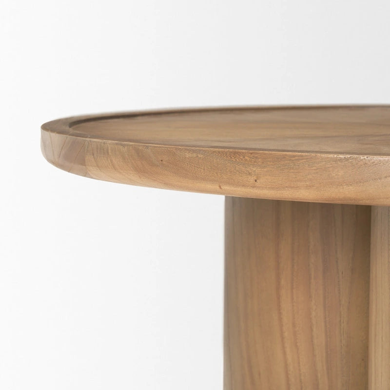 Table basse ronde de 99 cm en orme massif, piètement central à trois colonnes, naturel
