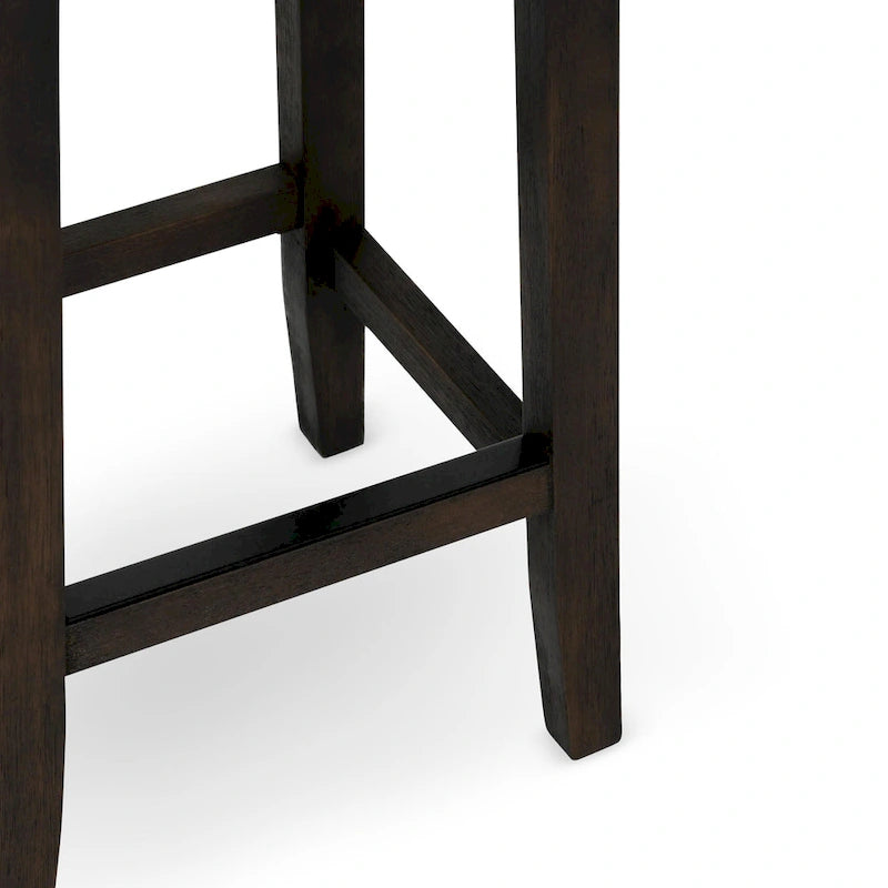 Tabouret de comptoir sans dossier en cuir végétalien, pieds en bois foncé, couleur caramel